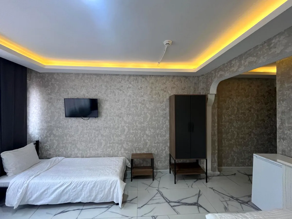 Ankara günlük kiralık ev Ankara günlük kiralık ev – çift kişilik yatak ve oturma alanı bulunan konaklama odası